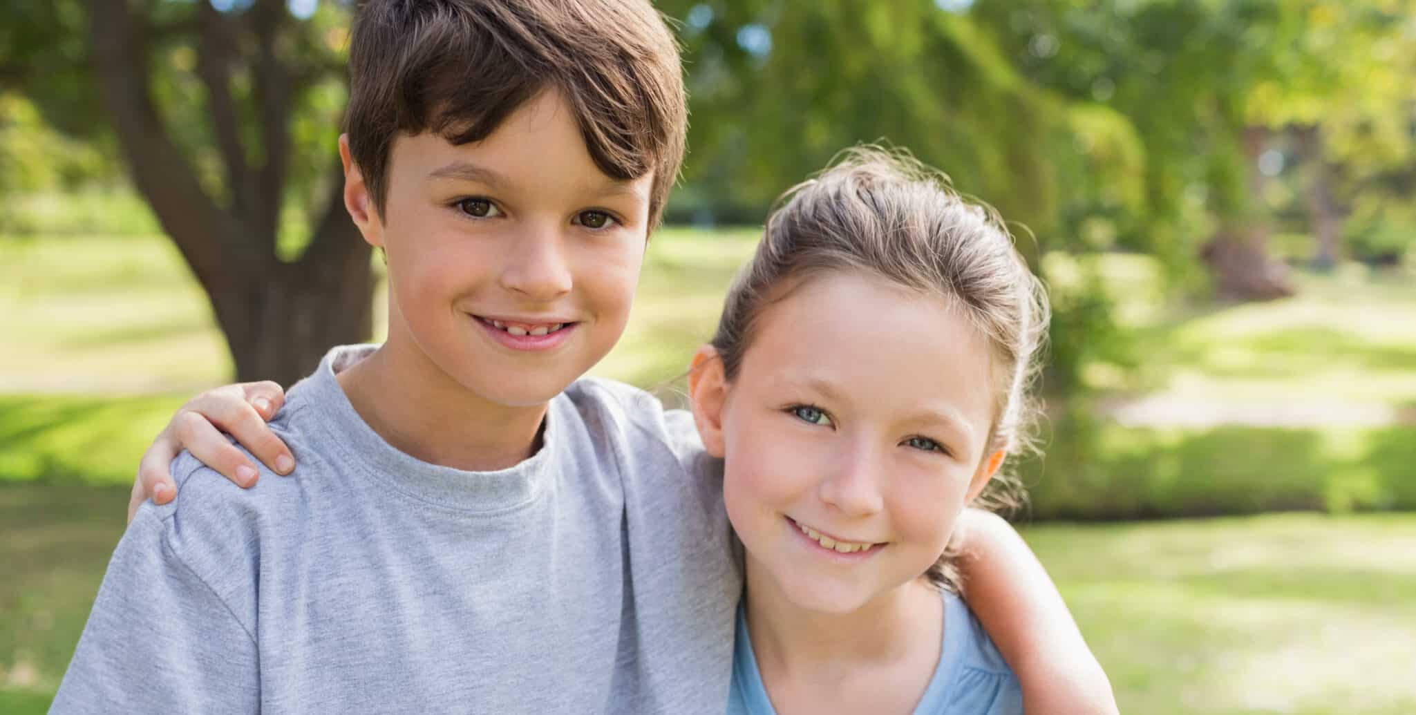 blog_staff-favorites-adoption-stories-3 Boy and girl siblings smiling at camera
