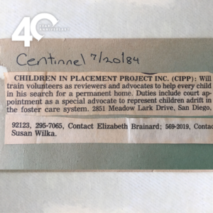 A newspaper clipping from 1984 recruiting volunteers to review case files of children.