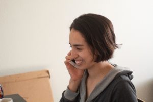 Smiling woman on telephone